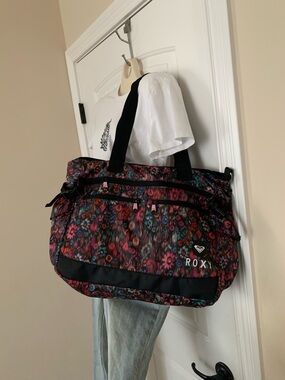 Roxy Floral Travel Tote in Black, Pink, Red and Teal